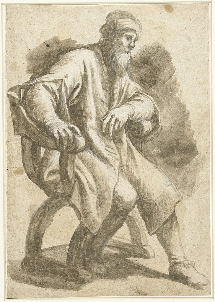 Uomo seduto in poltrona
